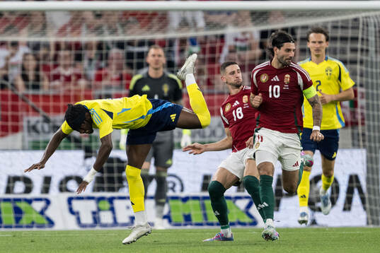 Anthony Elanga of Sweden against Zsolt Nagy and Dominik