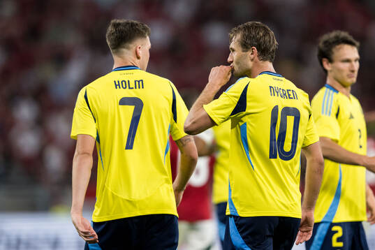 Emil Holm and Benjamin Nygren of Sweden celebrate