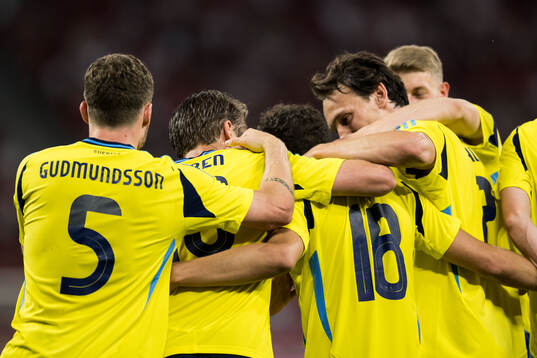 Yasin Ayari of Sweden celebrates with Gabriel Gudmundsson,