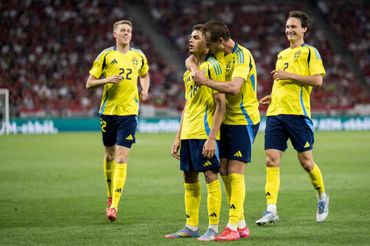 Yasin Ayari of Sweden celebrates with Benjamin Nygren