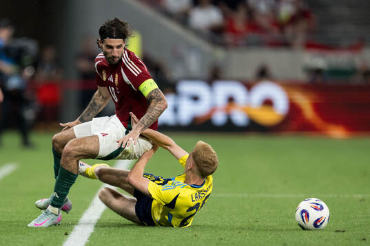 Dominik Szoboszlai of Hungary and Hugo Larsson of Sweden