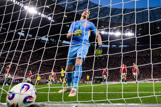 Goalkeeper Denes Dibusz of Hungary looks dejected