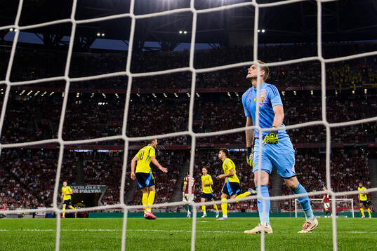 Benjamin Nygren and Yasin Ayari of Sweden celebrate the 0-2