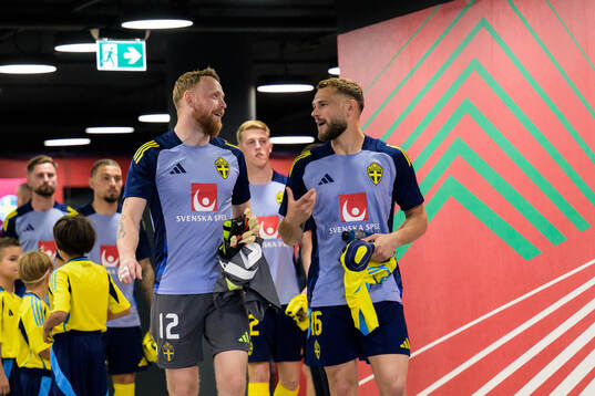 Goalkeeper Viktor Johansson and Jesper Karlström of Sweden