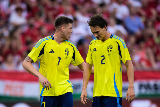 Emil Holm and Hjalmar Ekdal of Sweden
