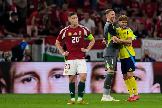 Roland Sallai of Hungary looks dejected as goalkeeper Robin