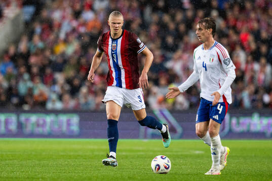 Erling Braut Haaland of Norway and Nicolo Rovella of Italy