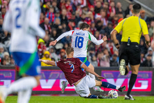 Kristoffer Ajer of Norway and Nicolo Barella of Italy