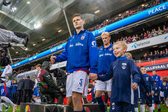 David Møller Wolfe of Norway enters the pitch
