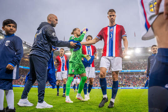 Kit manager Sigurd Ertsås and Kristoffer Ajer of Norway