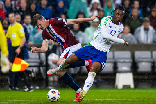 Alexander Sørloth of Norway and Destiny Udogie of Italy