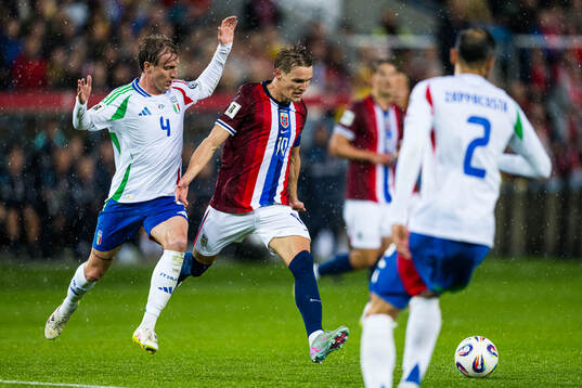Nicolo Rovella of Italy and Martin Ødegaard of Norway