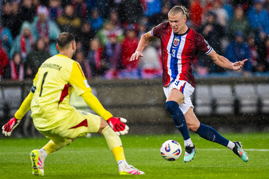 Erling Braut Haaland of Norway scores the 3-0 goal