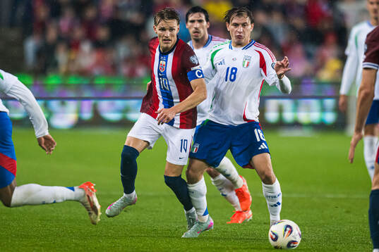 Martin Ødegaard of Norway and Nicolo Barella of Italy