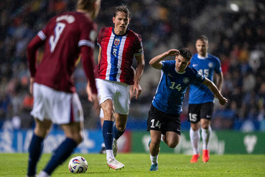Sander Berge of Norway and Patrik Kristal of Estonia