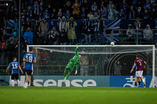 Rauno Sappinen of Estonia and goalkeeper Ørjan Håskjold