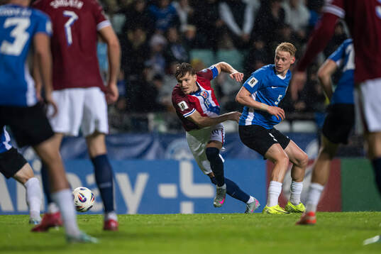 Martin Ødegaard of Norway and Rocco Shein of Estonia