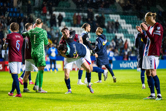 Jørgen Strand Larsen and Aron Dønnum of Norway celebrates