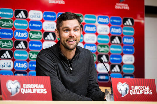 Head coach Jürgen Henn of Estonia at a press conference