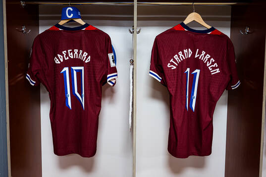 Shirts of Martin Ødegaard and Jørgen Strand Larsen of