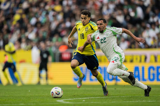 Yasin Ayari of Sweden and Ismael Bennacer of Algeria