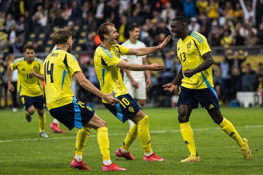 Ken Sema and Anton Salétros of Sweden celebrating the 3-0
