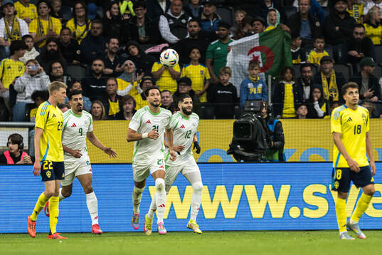 Yassine Benzia of Algeria celebrate with Baghdad Bounedjah