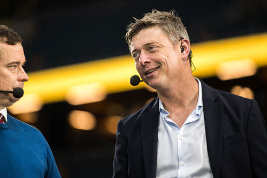 Erik Niva of Swedish broadcaster Viaplay and head coach Jon