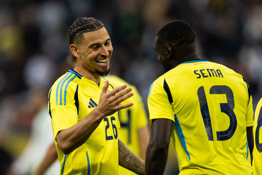 Ken Sema of Sweden celebrates with Jordan Larsson