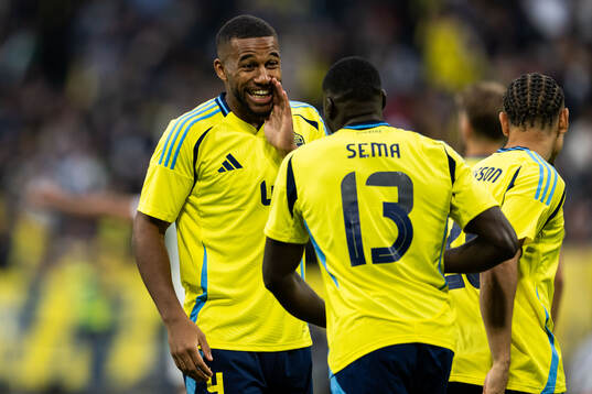 Ken Sema of Sweden celebrates with Isak Hien