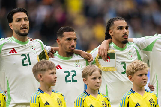 Ramy Bensebaini, Ismael Bennacer and Mohamed Farsi of
