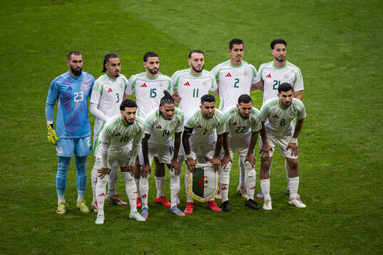 The starting eleven of Algeria pose for a team photo Top