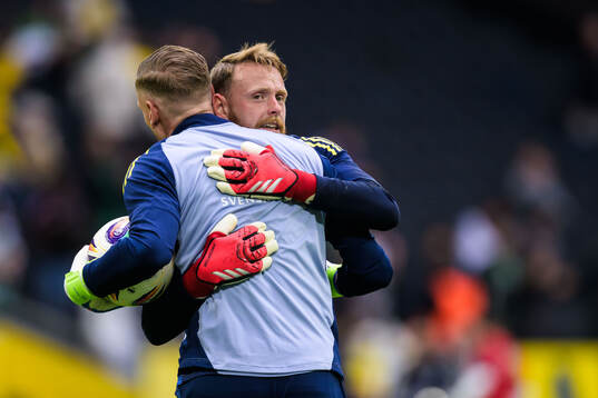 Goalkeeper Robin Olsen and goalkeeper Viktor Johansson of