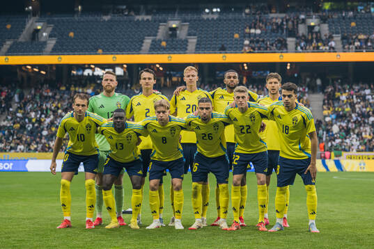 The starting eleven of Sweden pose for a team photo Top