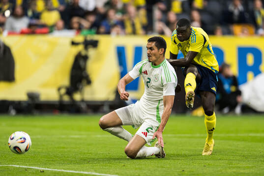 Ken Sema of Sweden scores the 2-0 goal against Aissa Mandi