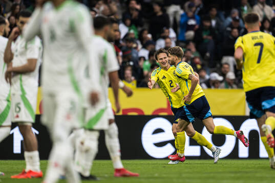Hjalmar Ekdal, Anton Salétros of Sweden celebrating the