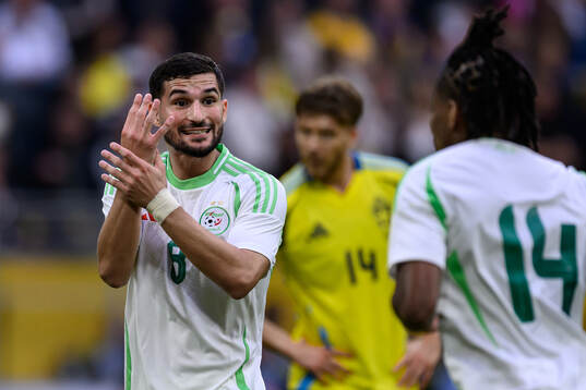 Houssem Aouar of Algeria reacts