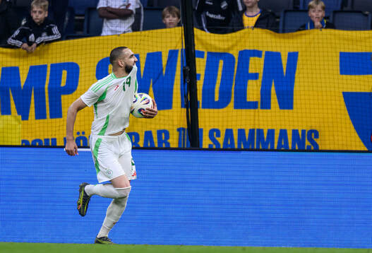 Nabil Bentaleb of Algeria celebrates the 4-2 goal