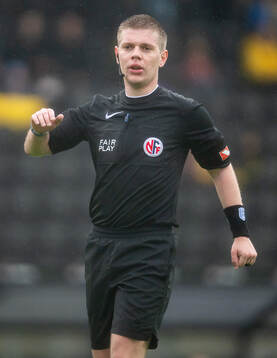 Referee Michael Wikestad Pedersen