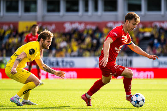 Ole Didrik Blomberg of Bodø/Glimt and Felix Horn Myhre of