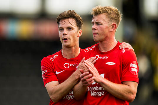 Felix Horn Myhre and Aune Heggebø of Brann looks dejected