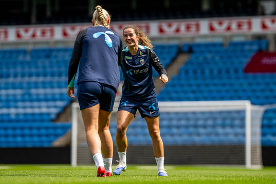 Maria Thorisdottir and Tuva Hansen of the Norwegian women's