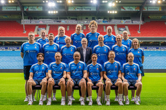 Staff of the Norwegian women's national football team pose