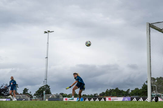 Stina Blackstenius and goalkeeper Emma Holmgren of the