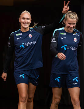Maria Thorisdottir and Ada Hegerberg of the Norwegian