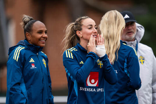 Madelen Janogy and Kosovare Asllani of the Swedish women's