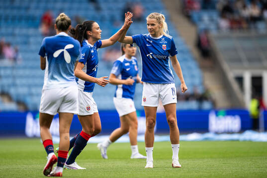 Ingrid Syrstad Engen and Ada Hegerberg of Norway