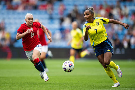 Thea Bjelde of Norway and Madelen Janogy of Sweden