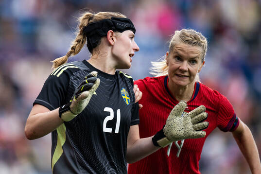 Goalkeeper Tove Enblom of Sweden and Ada Hegerberg of Norway