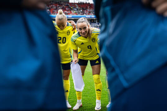 Hanna Bennison and Kosovare Asllani of Sweden
